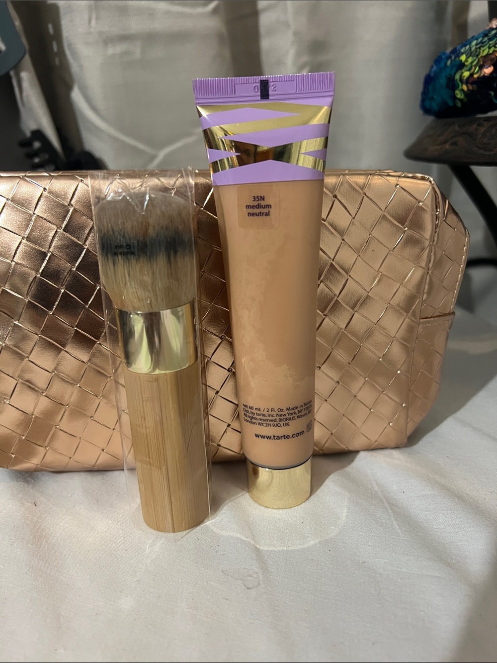 tarte foundation 35N Medium Neutral - beige with gold accents